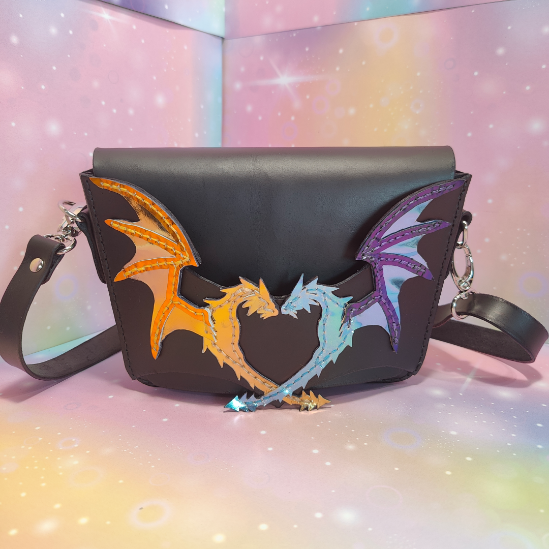 Black leather clutch bag with dragons