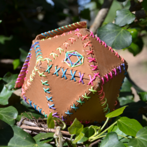 Handmade leather dice bag embroidered with rainbow thread